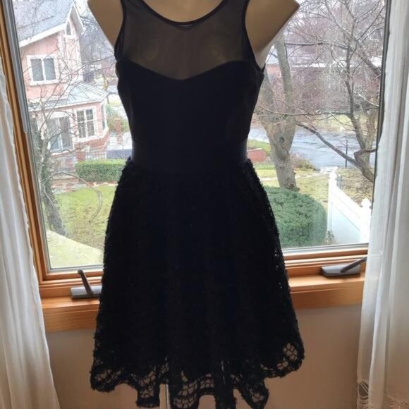 Designer Little black dress by Milly knee length with lace overlay